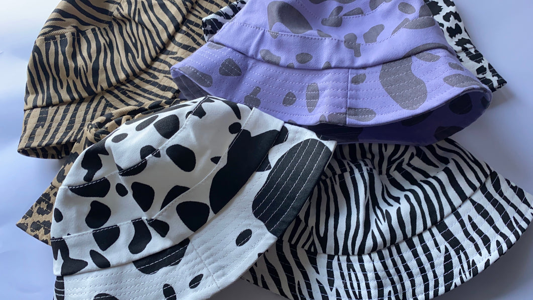 Lilac cow print bucket hat